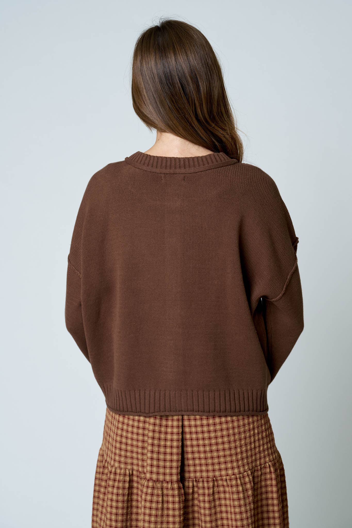 RAW EDGE EXPOSED SEAM BUTTON DOWN KNIT CARDIGAN